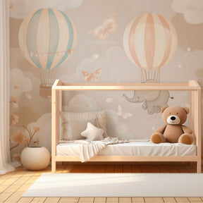 Pastel elephant mural wallpaper with hot air balloons for toddler room by Kids-Mundo