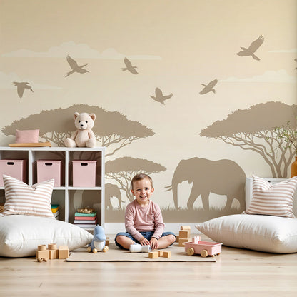 Kids-Mundo safari elephant silhouette wall mural shown as wallpaper in a warm-toned nursery.