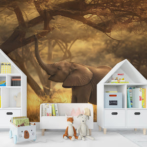 Golden safari elephant wallpaper creating cozy kids bedroom atmosphere with warm lighting