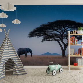 Safari night scene wallpaper creating peaceful children's bedroom decor with starlit elephant design