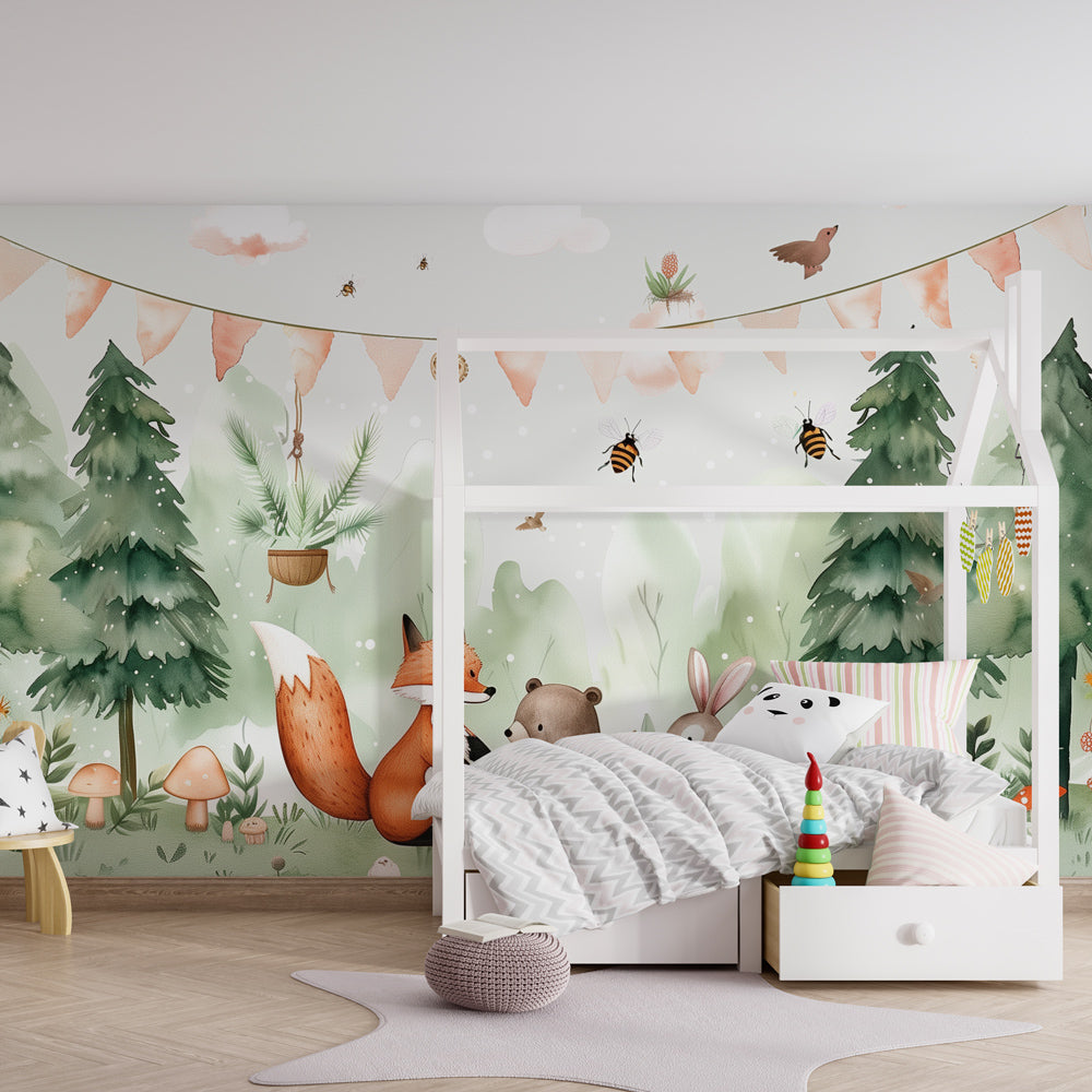 Woodland themed mural wallpaper creating magical playroom atmosphere for children