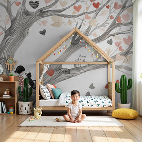Enchanted tree mural wallpaper with playful cats in modern gray nursery by Kids-Mundo