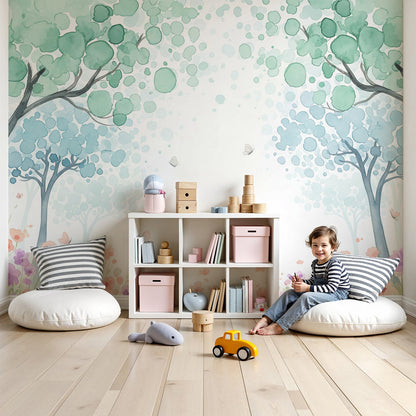 Kids-Mundo watercolour forest wall mural styled above a cot in a soft, dreamy nursery
