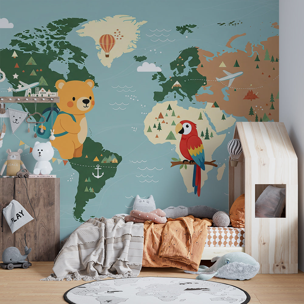 Kids-Mundo colourful world map wall mural in a playroom, showing a macaw, lighthouses and biplanes