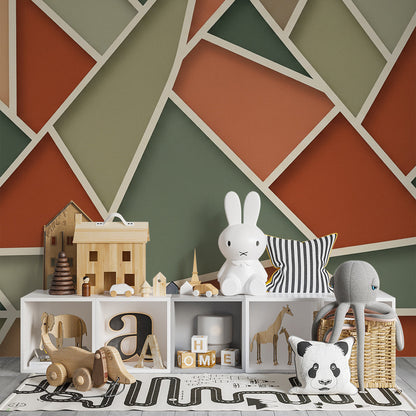 Playroom wall covered in a Kids-Mundo terracotta triangle mosaic mural beside toy shelves