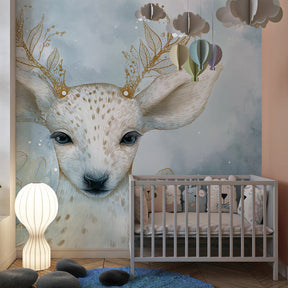 Gentle fawn wallpaper with golden accents decorating modern children's bedroom space