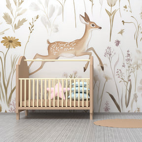 Baby room featuring enchanting fawn floral mural wallpaper with soft multicolored design
