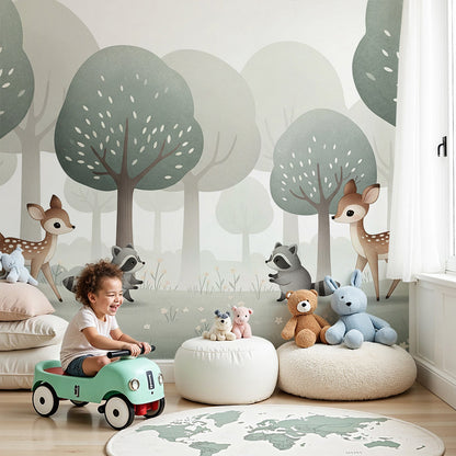 Kids-Mundo fawns and raccoons forest wall mural styled in a soft sage green nursery.
