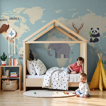 Kids-Mundo beige world map wall mural in a soft blue nursery with cot and toys