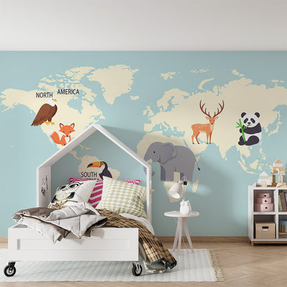 Kids-Mundo animal world map mural in a children's playroom with toucan and deer