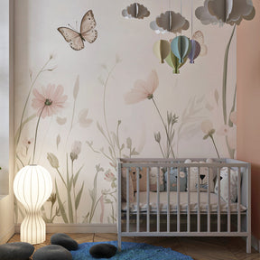 Nature-inspired floral mural wallpaper transforming baby room into garden sanctuary