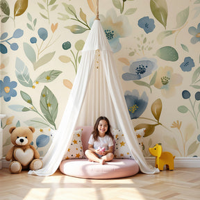 Pastel blue floral garden mural wallpaper in serene nursery setting by Kids-Mundo