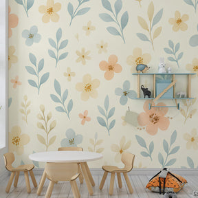Hand-painted flower wallpaper with light wood furniture in cozy children's bedroom setting