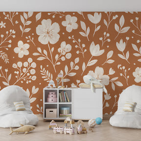 Terracotta floral wallpaper creating cozy children's bedroom atmosphere with white flowers