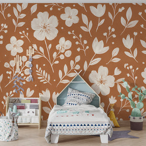 Hand-painted floral mural wallpaper transforming kids room with botanical terracotta design