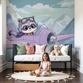 Flying raccoon mural wallpaper creating magical aviation-themed nursery decor by Kids-Mundo
