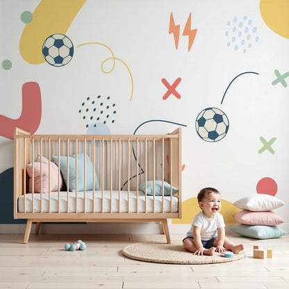 Kids-Mundo colourful football pattern wall mural styled in a bright nursery corner