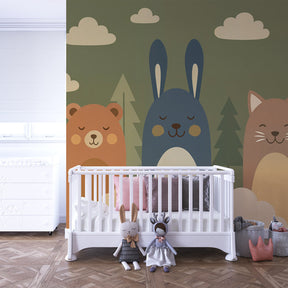 Cheerful woodland mural wallpaper in cozy kids bedroom showcasing forest creatures and trees