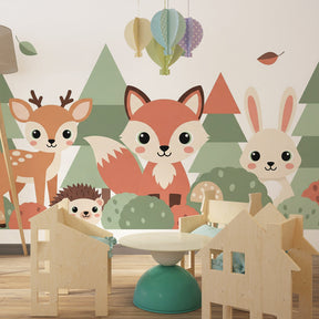 Woodland animals wallpaper with deer and fox creating magical kids bedroom atmosphere