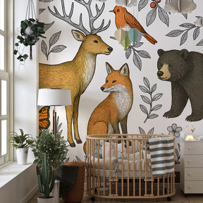 Forest theme mural wallpaper featuring deer fox bear and owl in children's room setting