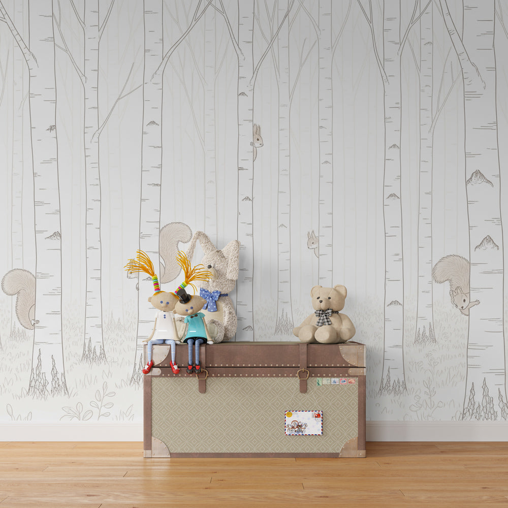 Forest themed mural wallpaper with playful squirrels for kids playroom design