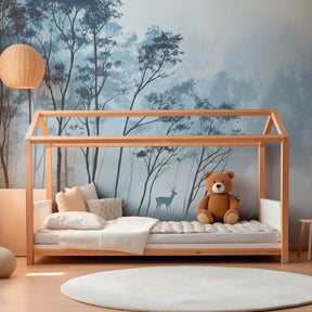 Blue forest deer wallpaper transforming children's bedroom into serene woodland sanctuary