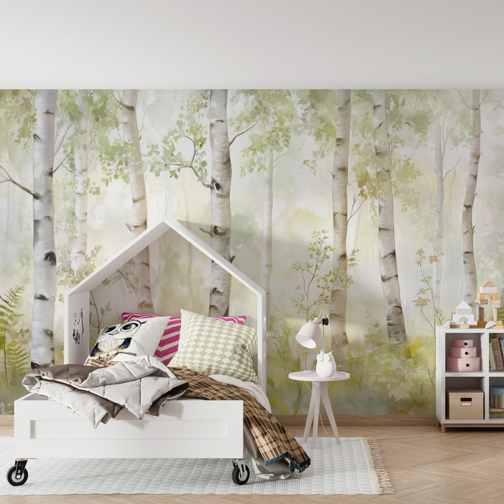 Forest themed children's bedroom featuring watercolor birch tree mural wallpaper in soft green tones