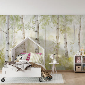 Forest themed children's bedroom featuring watercolor birch tree mural wallpaper in soft green tones
