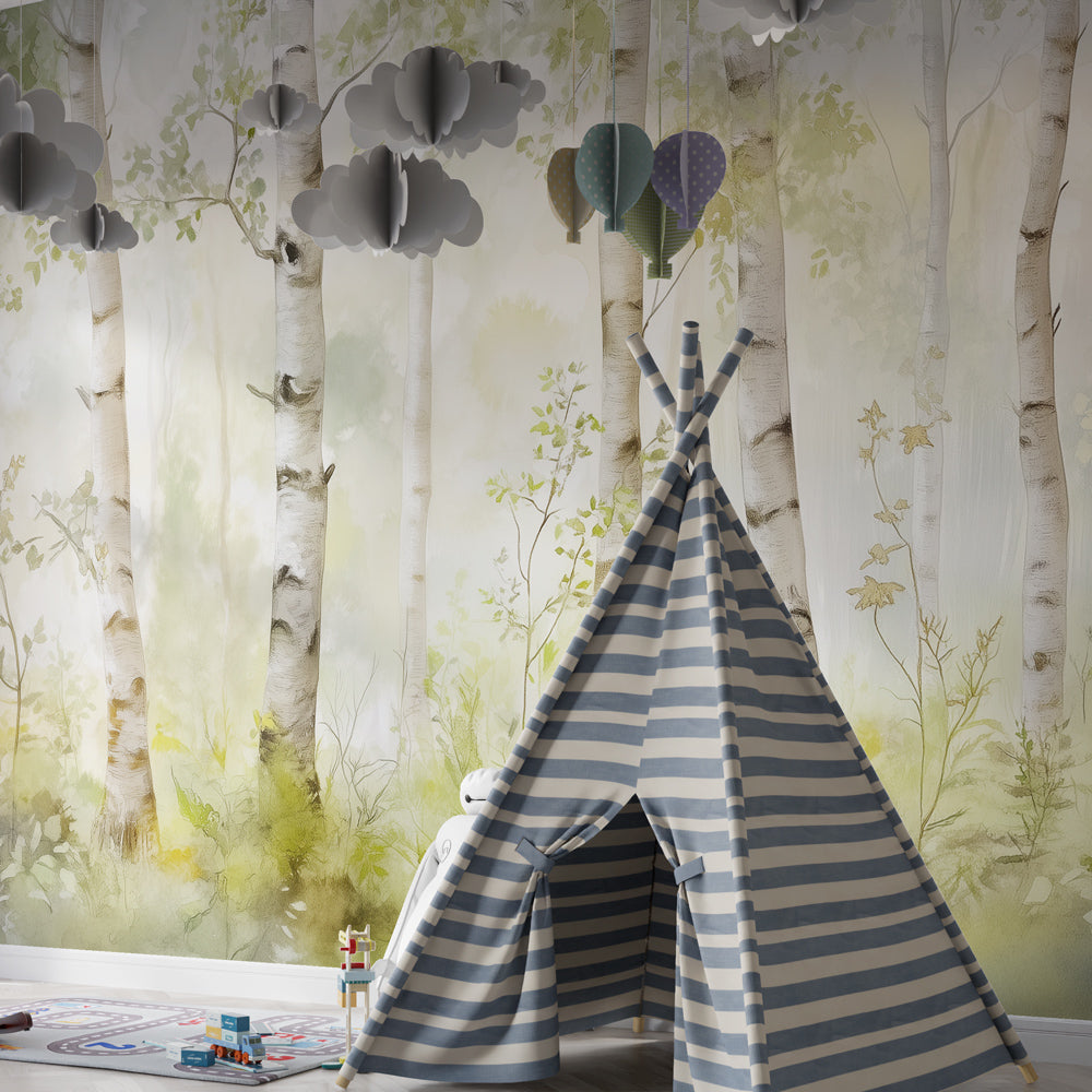 Peaceful baby nursery with watercolor forest mural wallpaper creating natural woodland atmosphere