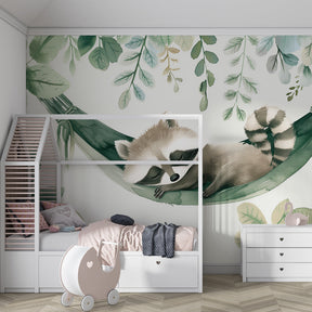 Woodland raccoon wallpaper creating serene kids bedroom with lush green forest foliage