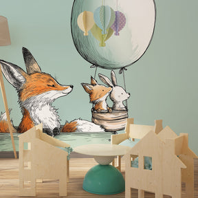 Whimsical fox and rabbit hot air balloon wallpaper creating magical kids bedroom decor
