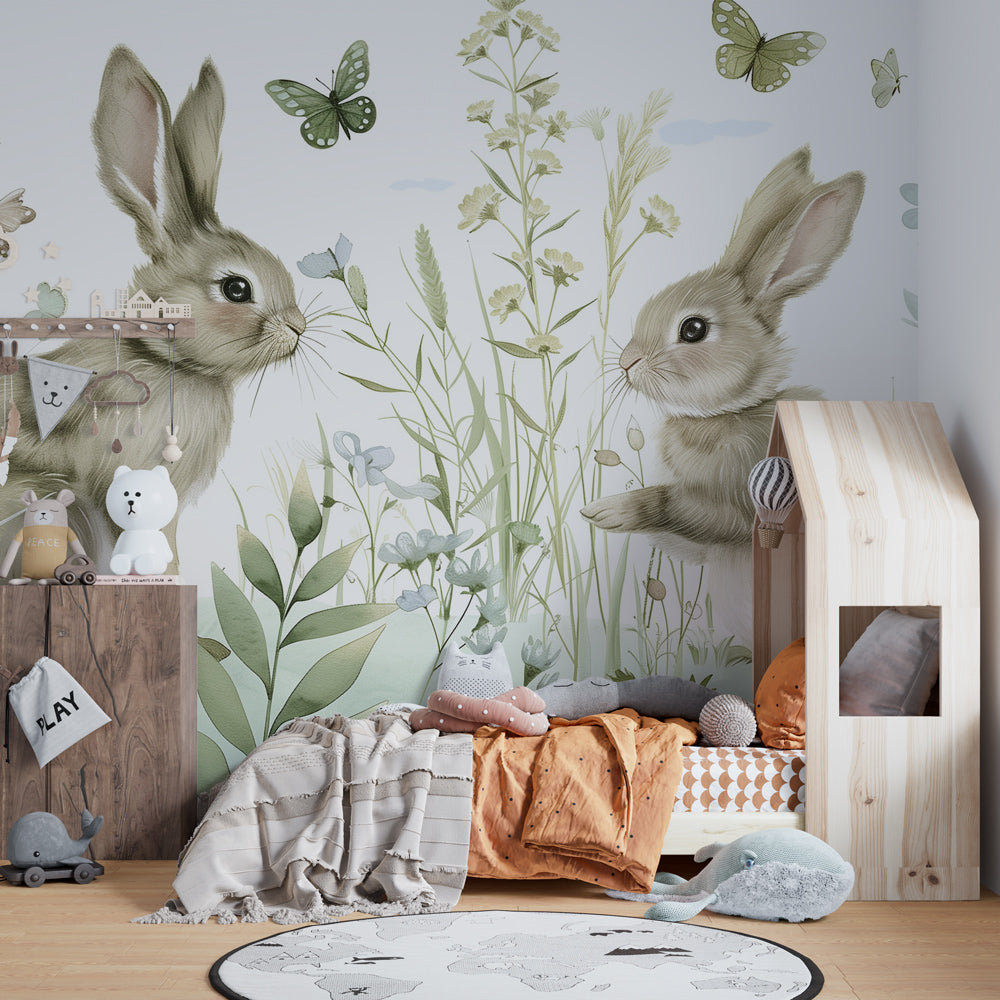 Woodland rabbit and butterfly wallpaper transforming kids bedroom into magical nature scene