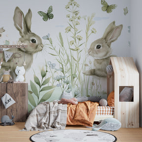Woodland rabbit and butterfly wallpaper transforming kids bedroom into magical nature scene