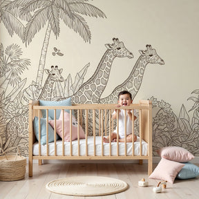 Giraffe jungle mural wallpaper creating safari-themed nursery decor with tropical animals by Kids-Mundo