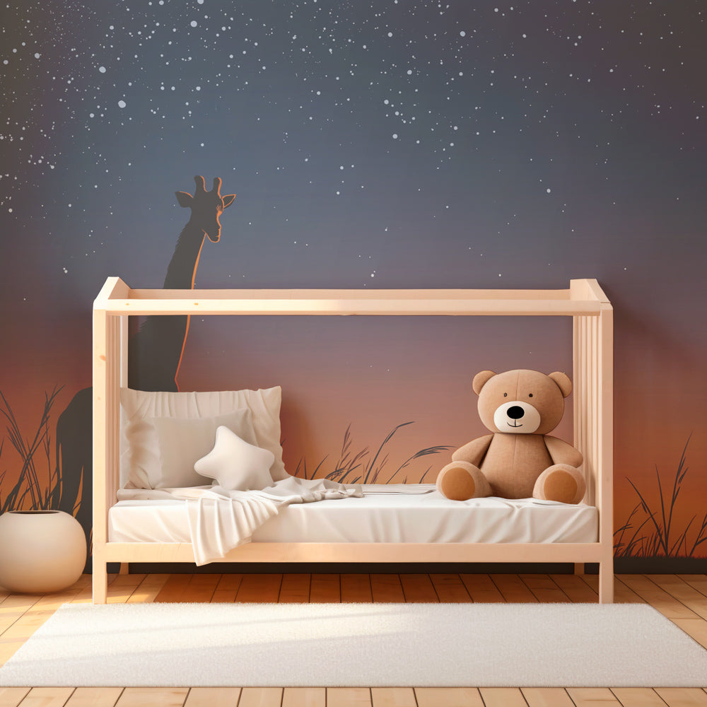 Safari giraffe mural wallpaper creating magical kids bedroom atmosphere with starry sky theme