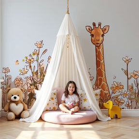 Giraffe mural wallpaper with flowers creating magical nursery decor by Kids-Mundo