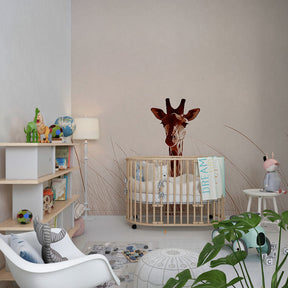 Gentle giraffe mural wallpaper transforming kids playroom into serene African grassland scene