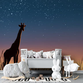 African giraffe mural wallpaper transforming children's playroom with sunset and stars design