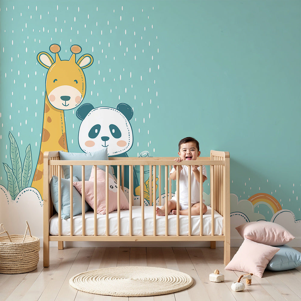 Giraffe and panda wall mural by Kids-Mundo styled in a soft neutral nursery with cot and shelving