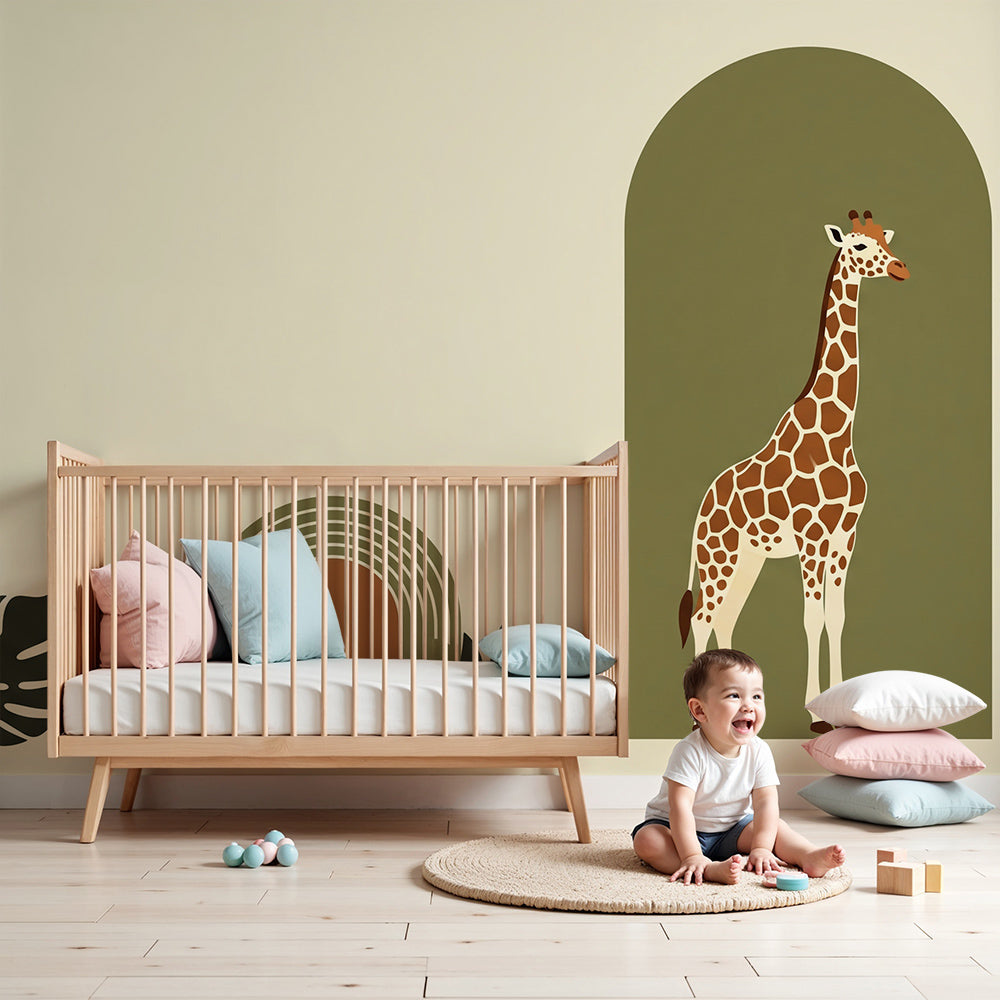 Kids-Mundo giraffe wall mural with sage green arches styled in a calm neutral nursery
