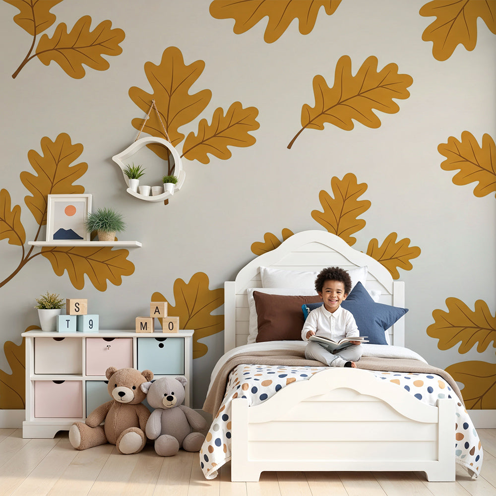 Kids-Mundo golden oak leaf wall mural styled in a calm cream nursery with a cot and soft lighting