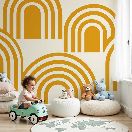 Nursery wall featuring the Kids-Mundo golden rainbow arches wall mural on a cream background