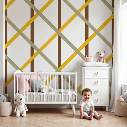 Kids-Mundo golden and sage trellis wall mural styled above a cot in a bright nursery.
