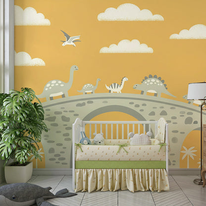 Kids-Mundo golden sky dinosaur mural covering a playroom wall with toy baskets
