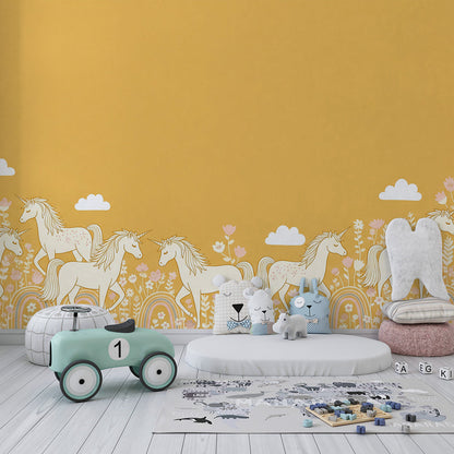 Kids-Mundo unicorn herd and rainbow wall mural covering a feature wall in a kids bedroom