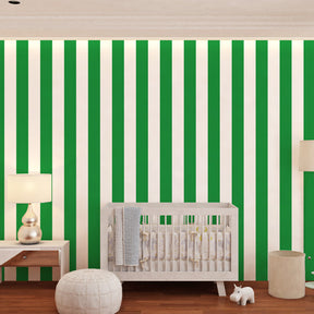 Fresh green striped wallpaper accent wall in colorful kids playroom with toys and accessories
