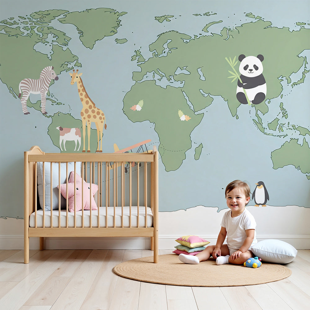 Green world map wall mural with biplane and giraffe painted in a Kids-Mundo nursery