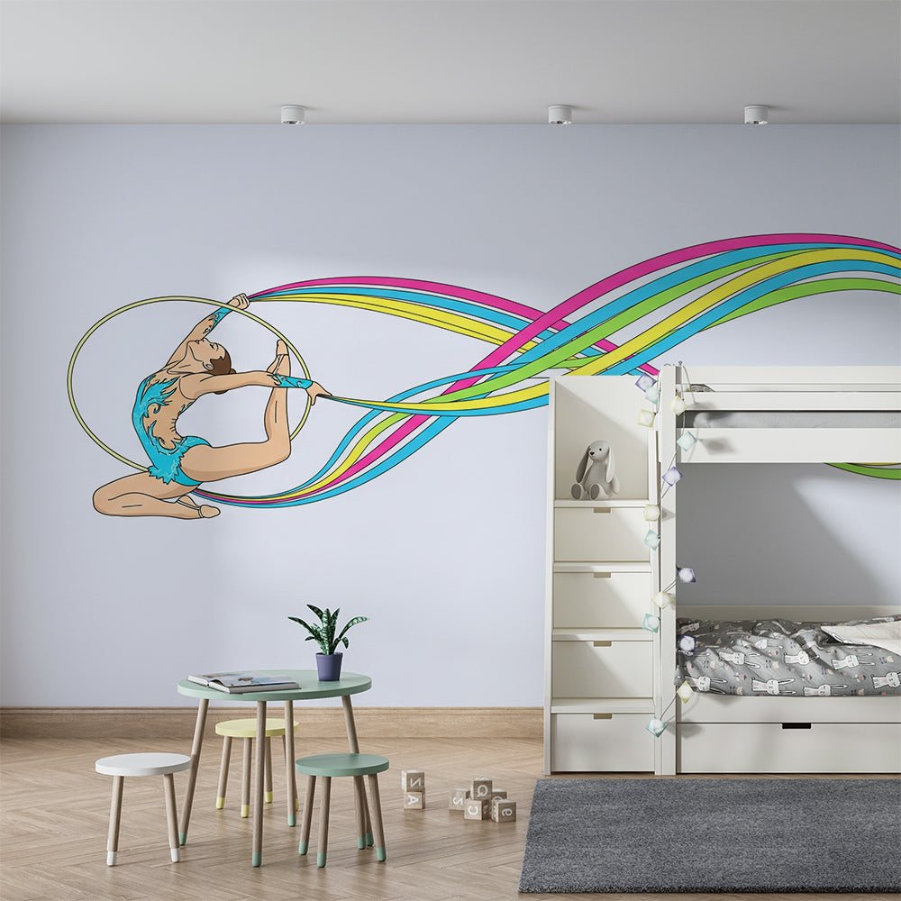 Kids-Mundo gymnast ribbon wallpaper mural styled behind a nursery cot and shelf