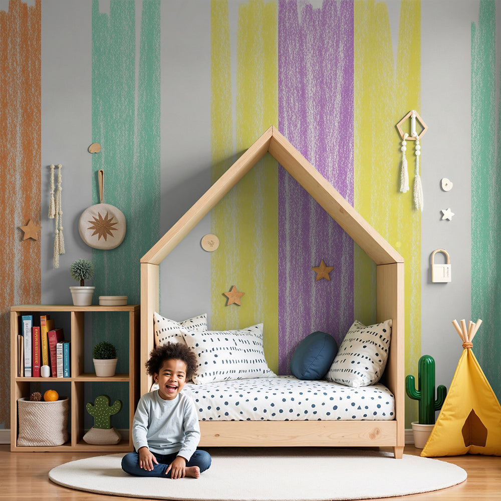 Kids-Mundo pastel crayon stripe wall mural in a bright nursery with a cot and soft furnishings