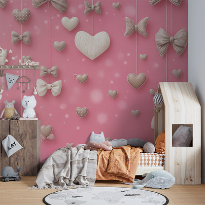 Kids-Mundo pink hearts and bows wall mural styled in a bright children's playroom.